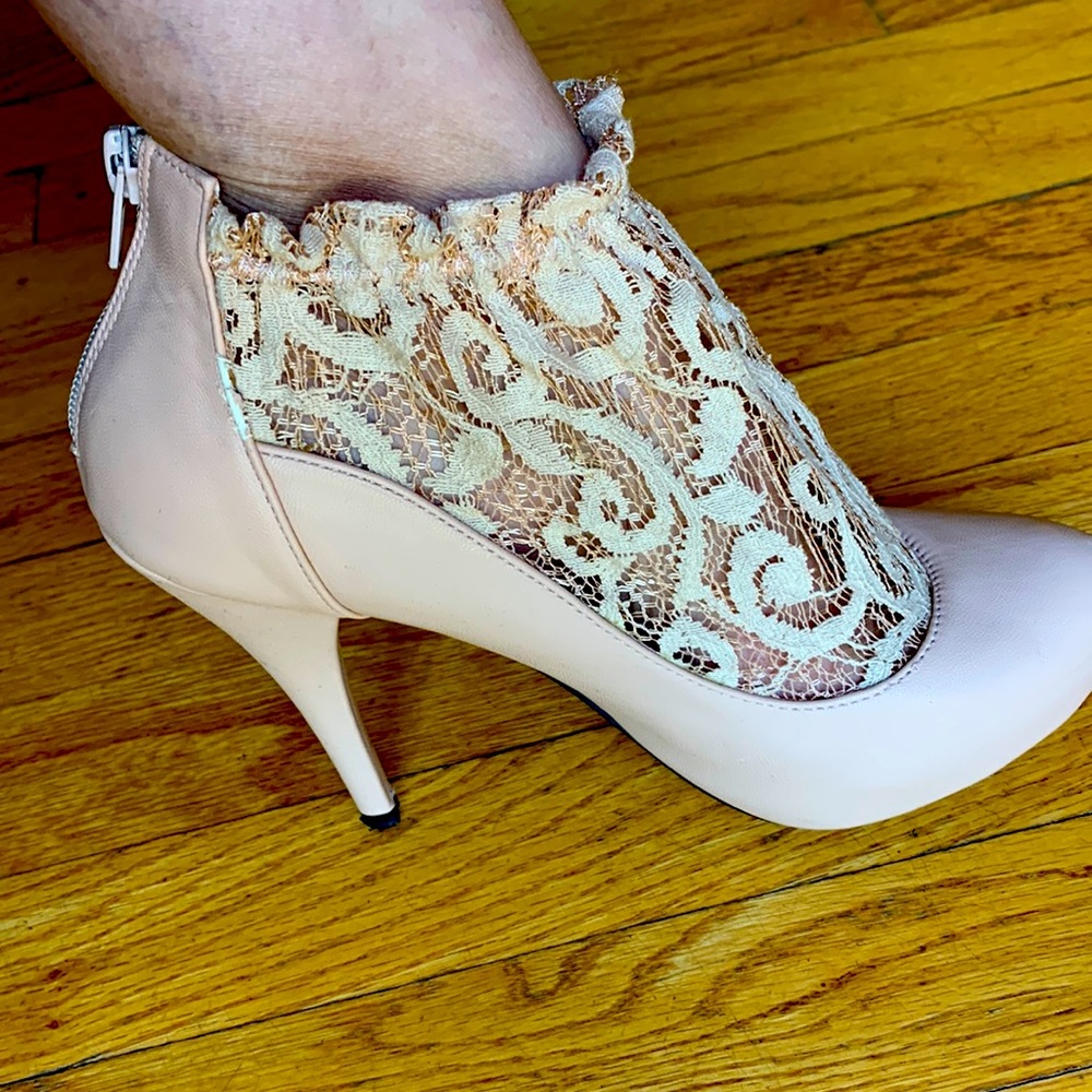 Nude color shoes with lace one a few times in very good condition